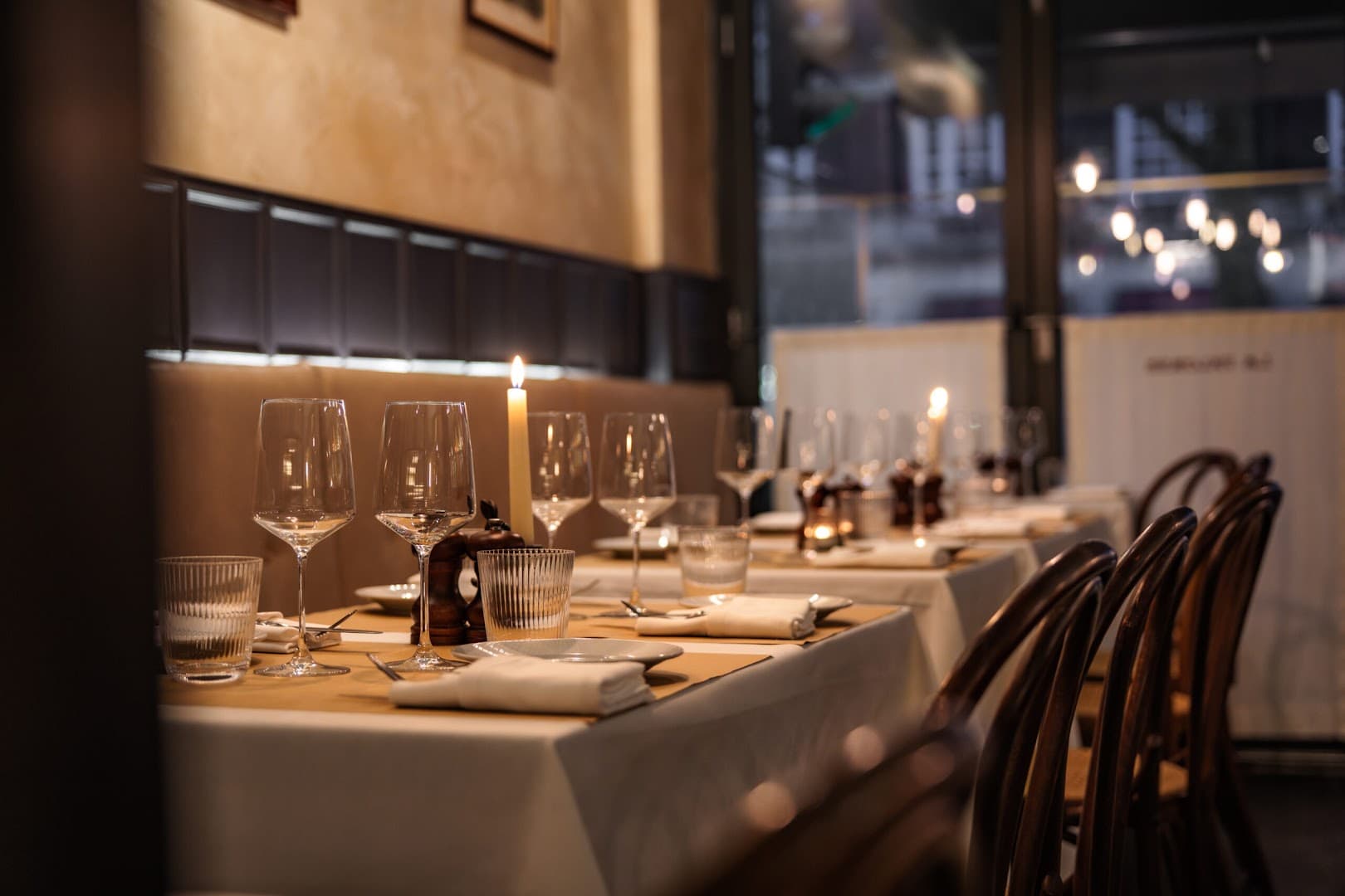 Candlelit table setting at La Palombe Kensington, London