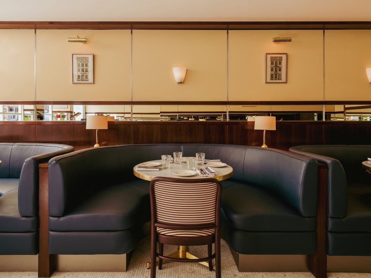 Booth seating area at Le Café NAC, London