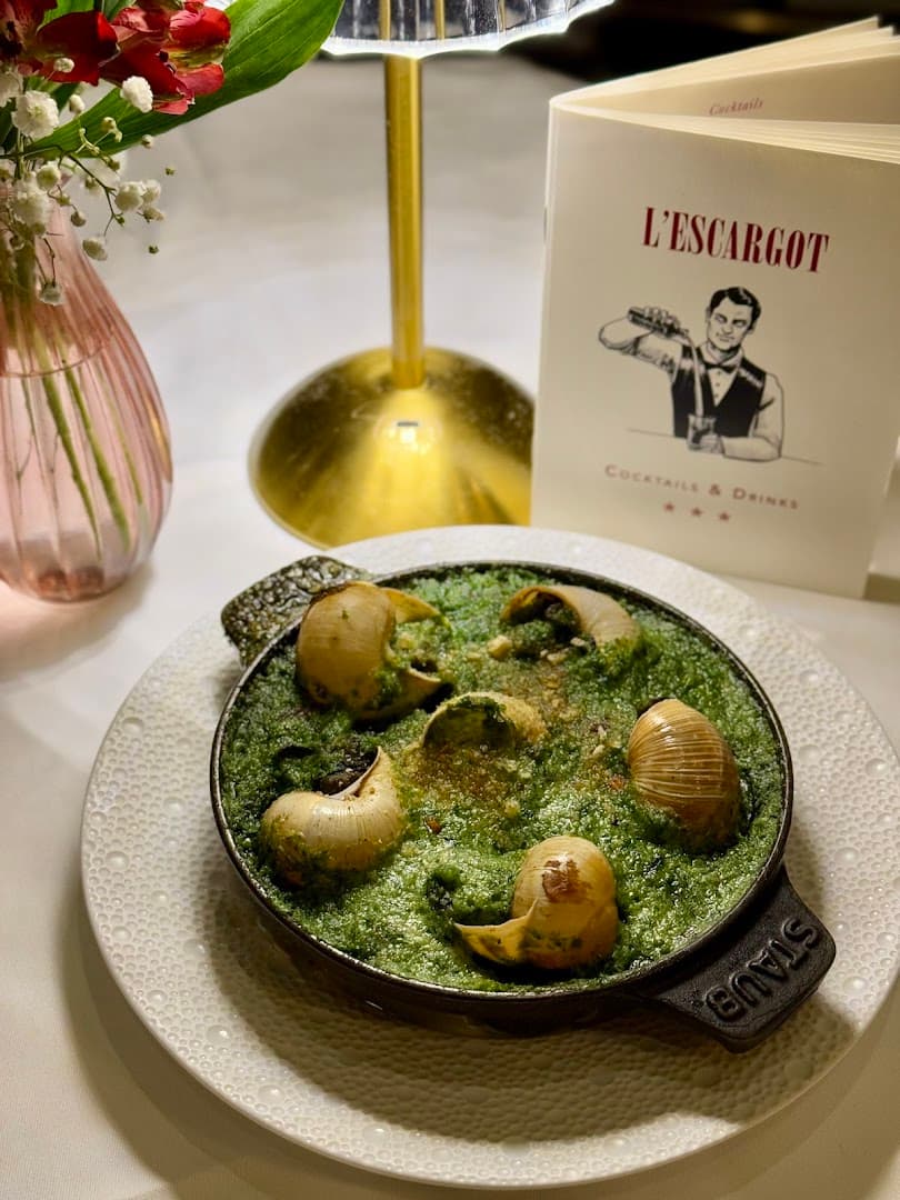 Escargot dish in garlic butter at L'Escargot Restaurant, London