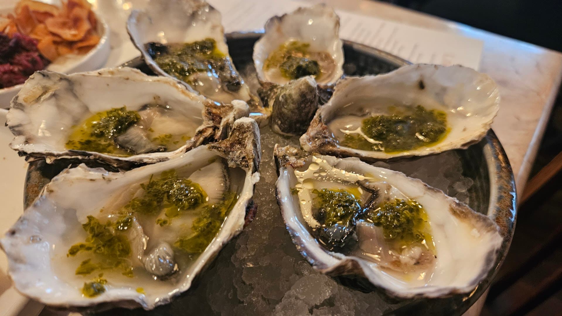 Fresh oysters with herb butter at Lore of the Land, London