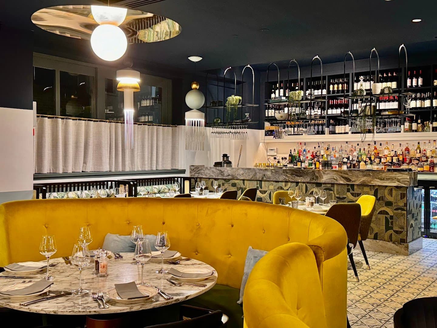Modern bar and dining area at Mielo Restaurant, London