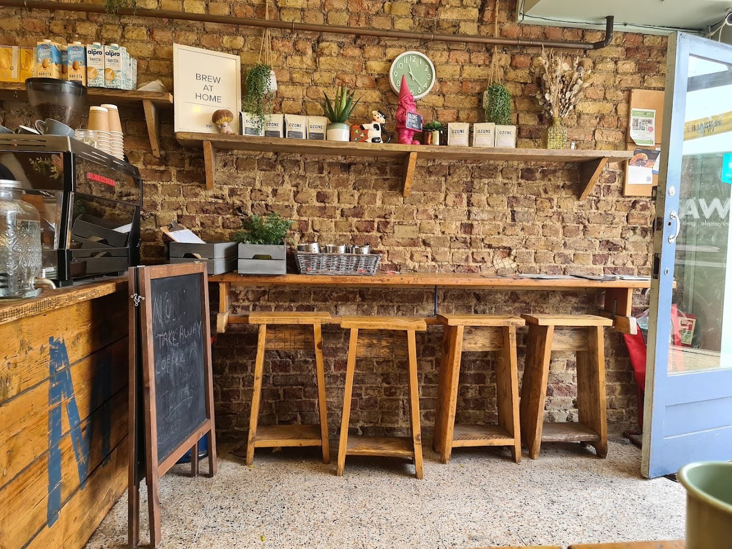 Rustic coffee bar seating at Mud, London