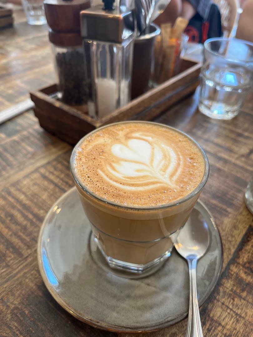 Latte coffee at Ollie's House Restaurant, Chelsea, London