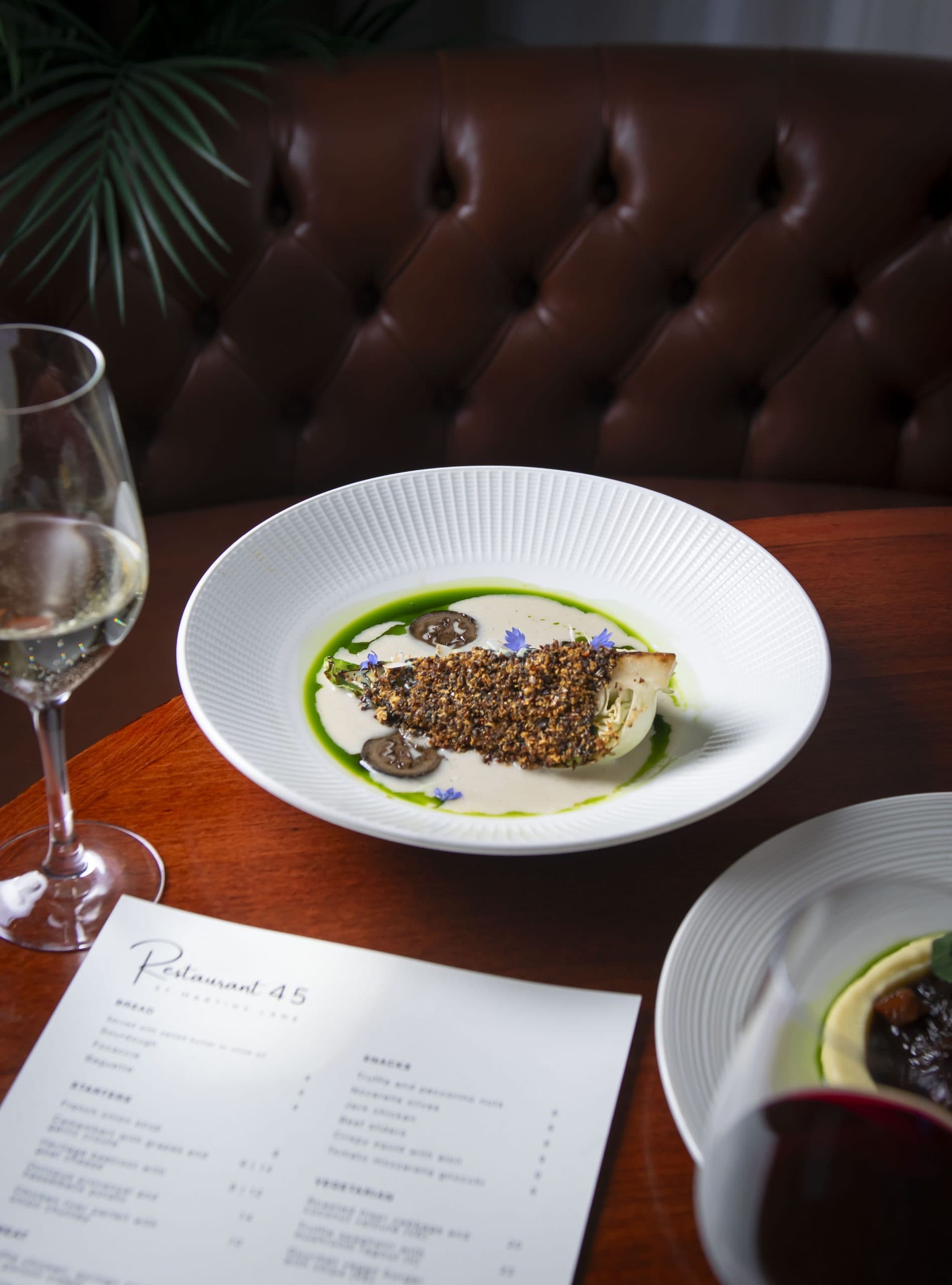 Crusted fish dish with white wine at Restaurant 45 St Martins Lane, London