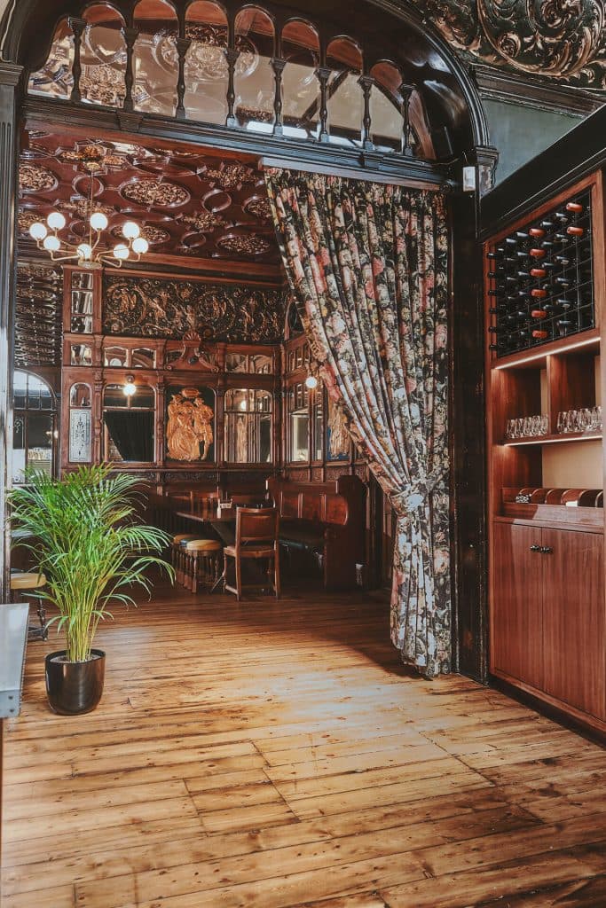 Ornate bar entrance at The Black Lion Pub & Boutique Guesthouse, London