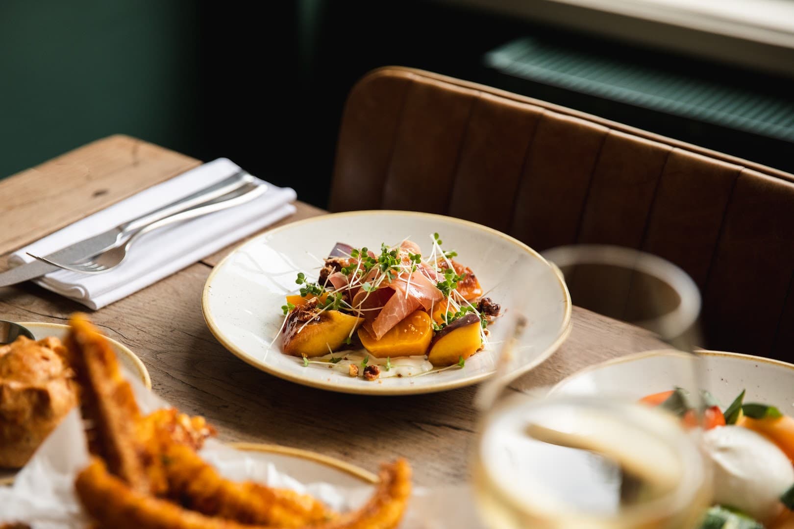 Roasted peach and prosciutto starter at The Duke of Hamilton, London