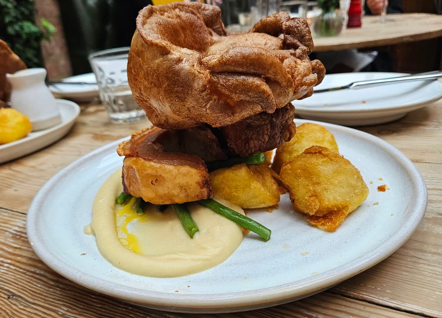 Beef Wellington with Yorkshire pudding at The Fox and Pheasant, London