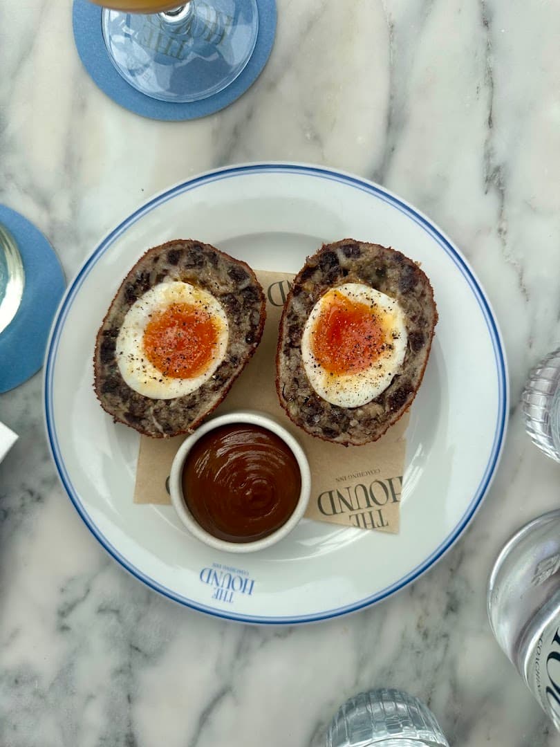 Scotch eggs with sauce at The Hound, London