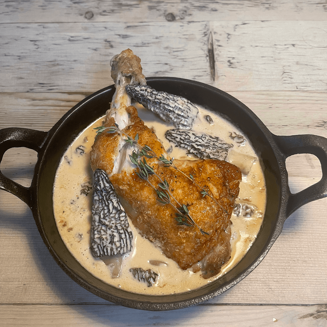 Crispy chicken with morel mushroom sauce at The Red Lion & Sun, London
