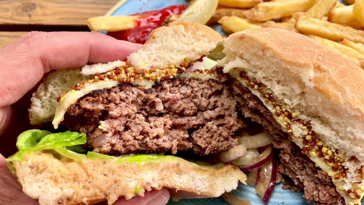 Gourmet burger with chips at The Red Lion & Sun, London