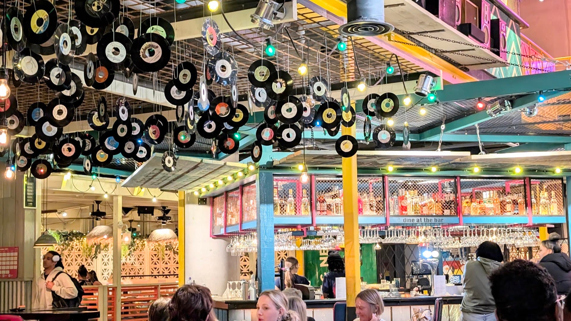Bar area with vinyl record ceiling at Turtle Bay Hammersmith, London