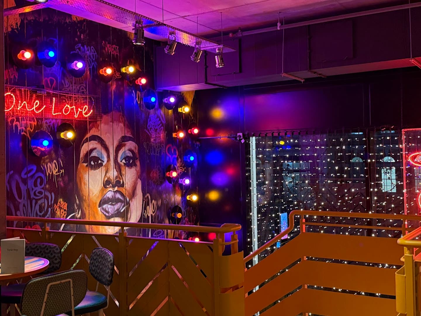 Vibrant bar area with street art at Turtle Bay Hammersmith, London