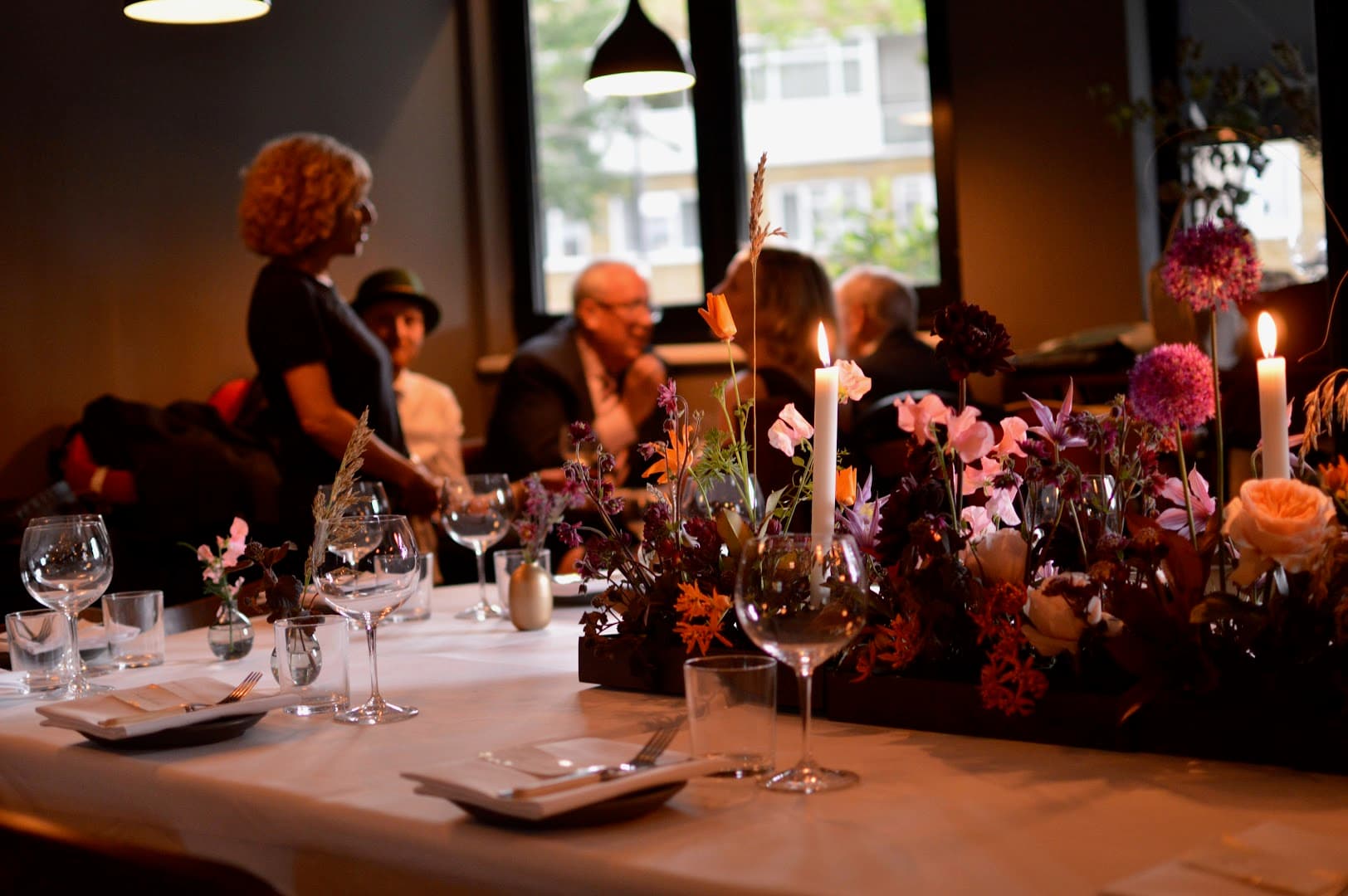 Candlelit table setting at Vins, London