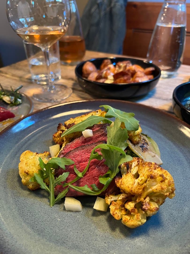 Steak dish with cauliflower at Vins, London