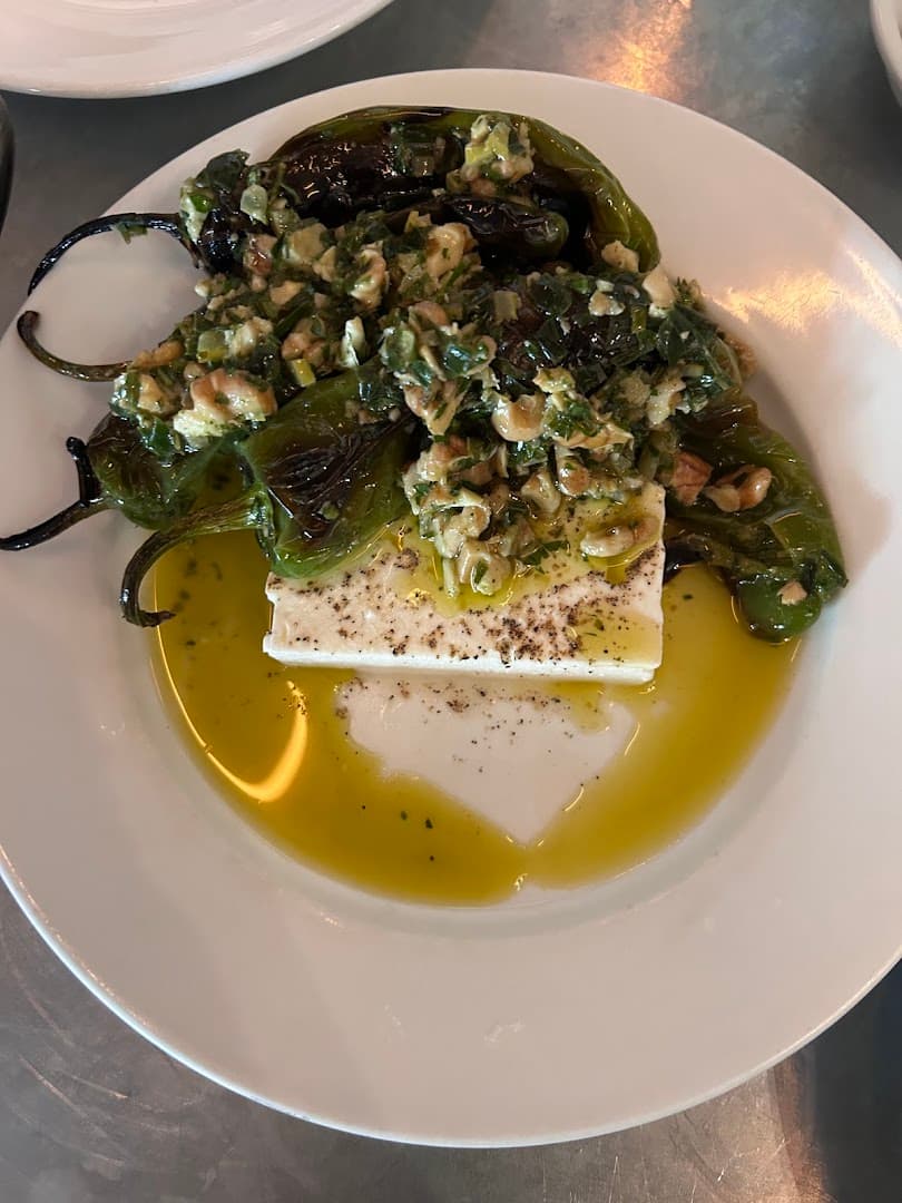 Baked feta with roasted peppers dish at Westerns Laundry, London